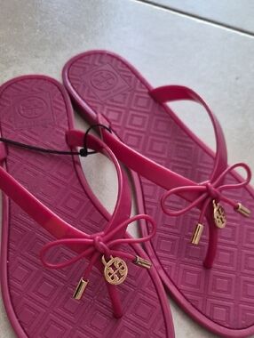 Tory Burch Hot Pink Bow Jelly Thong Sandals with Gold Logo Charm